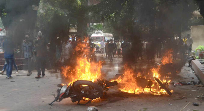 জেলায় জেলায় সংঘর্ষ-গুলি, নিহত অন্তত ১০০
